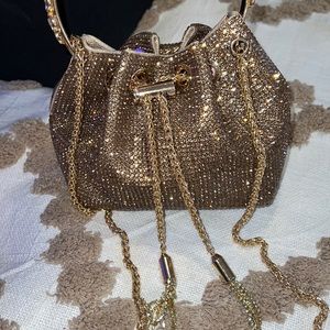 Golden purse never used but just a fashion bag purchased off Amazon